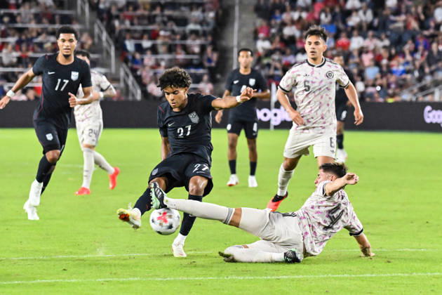 ST. LOUIS, MO - SEPTEMBER 29: Defender Ivan Roman (4) of Chile slides and blocks the shot attempt by defender Mathis Albert (27) of The United States during the Impact Match where the United States Men™s national team, Nationalteam hosted the Chile Men™s National Team on Tuesday September 29th, 2026, at Energizer Park in St. Louis City, MO. (Photo by Rick Ulreich Icon Sportswire) SOCCER: SEP 29 USA vs Chile EDITORIAL USE ONLY Icon26092934