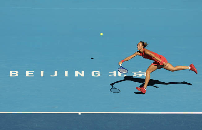 (261001) -- BEIJING, Oct. 1, 2026 -- Zheng Qinwen competes during the women s singles first round match between Zheng Qinwen of China and Shi Han of China at 2026 China Open tennis tournament in Beijing, China, Oct. 1, 2026. ) (SP)CHINA-BEIJING-TENNIS-CHINA OPEN-WOMEN S SINGLES(CN) BaixXuefei