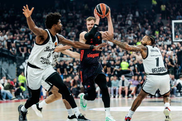 MUNICH, GERMANY - OCTOBER 02: Andreas Andi Obst (FC Bayern Muenchen, 13) controls the ball against Kevarrius Hayes (Partizan Mozzart Bet Belgrade, 13) and Carlik Jones (Partizan Mozzart Bet Belgrade, 1) during the Turkish Airlines EuroLeague match between FC Bayern Muenchen vs. Partizan Mozzart Bet Belgrade at SAP Garden on round 3 of Turkish Airlines EuroLeague on October 02, 2026 in Munich, Germany. Bavaria Germany Copyright: xSteffiexWunderlx