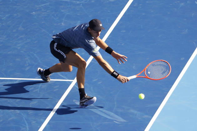 October 3, 2026, Tokyo, Japan: Matteo Arnaldi (Italy) returns a shot against Carlos Alcaraz (Spain) during their Round of 16 match at the Kinoshita Group Japan Open Tennis Championships at Ariake Colosseum in Tokyo. The tournament runs from September 29 to October 6. Alcaraz won 7-6(6), 6-1. Tokyo Japan - ZUMAm191 20261003_aap_m191_050 Copyright: xRodrigoxReyesxMarinx