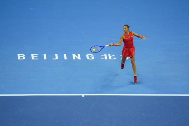 (261003) -- BEIJING, Oct. 3, 2026 -- Zheng Qinwen of China hits a return to Anna Kalinskaya of Russia during the women s singles second round match at 2026 China Open tennis tournament in Beijing, China, Oct. 3, 2026. ) (SP)CHINA-BEIJING-TENNIS-CHINA OPEN-WOMEN S SINGLES(CN) XiexHan 