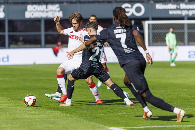 KOELN, GERMANY - OCTOBER 3, 2026: Jan Thielmann (1. FC Köln, 29) and Lucas Wolf (FC Viktoria Köln, 21) during the friendly match between FC Viktoria Köln vs. 1. FC Köln at the Sportpark Hoehenberg on October 3, 2026 in Koeln, Germany. DFL REGULATIONS PROHIBIT ANY USE OF PHOTOGRAPHS AS IMAGE SEQUENCES AND OR QUASI-VIDEO. Nordrhein-Westfalen Germany Copyright: xLeahxKohringx