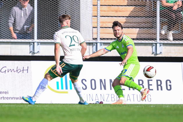03.10.2026, Fussball, Saison 2026 2027, Testspiel, SC Austria Lustenau - FC Schalke 04, Niklas Pertlwieser (SC Austria Lustenau), Adrian Gantenbein (FC Schalke 04) xRHR-FOTO YYx Copyright: KROEGER RHR-FOTOx RHR-FOTO YY