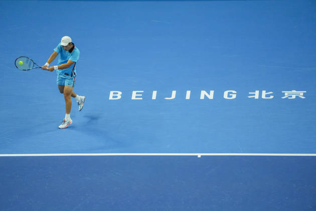 (261003) -- BEIJING, Oct. 3, 2026 -- Shang Juncheng of China hits a return to Alexander Zverev of Germany during the men s singles second round match at 2026 China Open tennis tournament in Beijing, China, Oct. 3, 2026. ) (SP)CHINA-BEIJING-TENNIS-CHINA OPEN-MEN S SINGLES(CN) XiexHan 