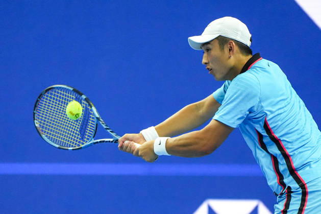 (261003) -- BEIJING, Oct. 3, 2026 -- Shang Juncheng of China hits a return to Alexander Zverev of Germany during the men s singles second round match at 2026 China Open tennis tournament in Beijing, China, Oct. 3, 2026. ) (SP)CHINA-BEIJING-TENNIS-CHINA OPEN-MEN S SINGLES(CN) XiexHan 
