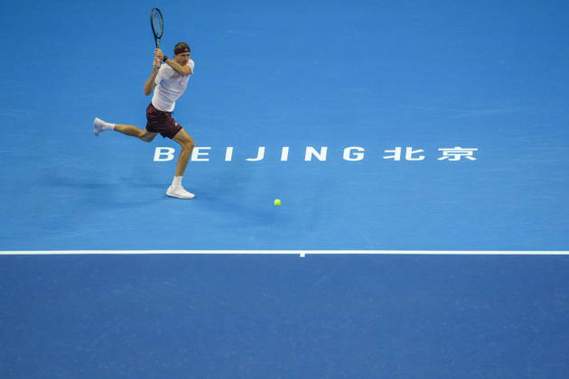 (261003) -- BEIJING, Oct. 3, 2026 -- Alexander Zverev of Germany hits a return to Shang Juncheng of China during the men s singles second round match at 2026 China Open tennis tournament in Beijing, China, Oct. 3, 2026. ) (SP)CHINA-BEIJING-TENNIS-CHINA OPEN-MEN S SINGLES(CN) XiexHan 