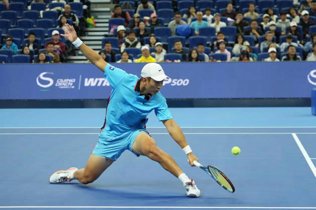 (261003) -- BEIJING, Oct. 3, 2026 -- Shang Juncheng of China hits a return to Alexander Zverev of Germany during the men s singles second round match at 2026 China Open tennis tournament in Beijing, China, Oct. 3, 2026. ) (SP)CHINA-BEIJING-TENNIS-CHINA OPEN-MEN S SINGLES(CN) XiexHan 