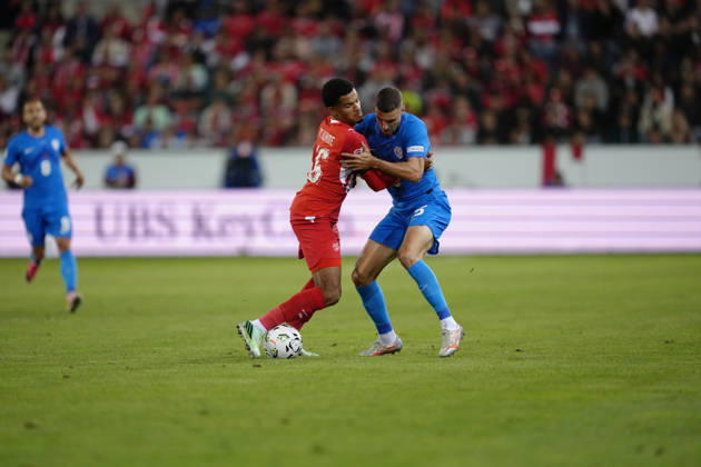 Luzern, Switzerland - October 03: Zachary Athekame (16 SUI) against Danijel Sturm (15 SLO) during the UEFA Nations League match between Switzerland and Slovenia at thermoplan arena on October 03, 2026 in Luzern, Switzerland. Copyright: xKjetilxWaberx xSPPx Sportspressphoto_SPR244725