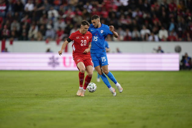 Luzern, Switzerland - October 03: Danijel Sturm (15 SLO) against Michel Aebischer (20 SUI) during the UEFA Nations League match between Switzerland and Slovenia at thermoplan arena on October 03, 2026 in Luzern, Switzerland. Copyright: xKjetilxWaberx xSPPx Sportspressphoto_SPR244736
