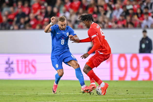 Sandi Lovric (Slovenia) and Johan Manzambi (Switzerland) battle for the ball during the UEFA Nations League 2026 27 group phase match between Switzerland and Slovenia at Luzern Arena on October 3, 2026 in Lucerne, Switzerland. (Photo by Harry Langer DeFodi Images) -