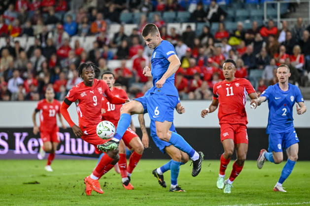 Johan Manzambi (Switzerland), Jaka Bijol (Slovenia), Dan Ndoye (Switzerland) and Zan Karnicnik (Slovenia) battle for the ball during the UEFA Nations League 2026 27 group phase match between Switzerland and Slovenia at Luzern Arena on October 3, 2026 in Lucerne, Switzerland. (Photo by Harry Langer DeFodi Images) -