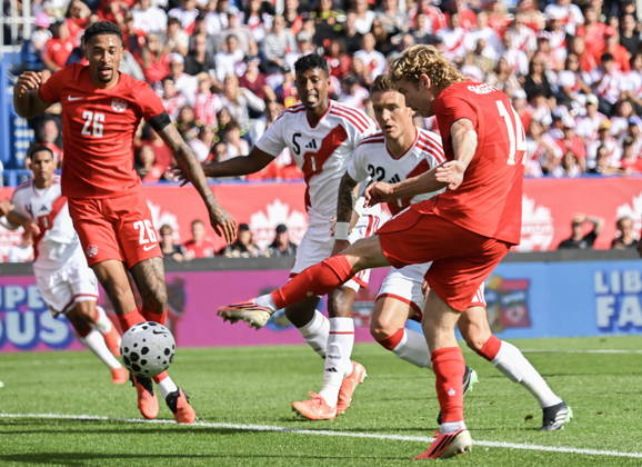 October 3, 2026, Montreal, Pq, Canada: Canada s Jacob Shaffelburg (14) scores against Peru during first half International Friendly, Länderspiel, Nationalmannschaft soccer action in Montreal, on Saturday, Oct. 3, 2026. Canada News - October 3, 2026 - ZUMAc35_ 20261003_zaf_c35_028 Copyright: xGrahamxHughesx