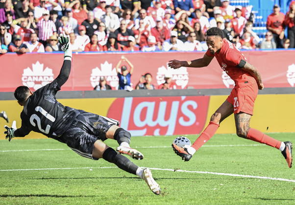 October 3, 2026, Montreal, Pq, Canada: Peru goalkeeper Diego Romero (21) closes down Canada s Daniel Jebbison (26) during first half International Friendly, Länderspiel, Nationalmannschaft soccer action in Montreal, on Saturday, Oct. 3, 2026. Canada News - October 3, 2026 - ZUMAc35_ 20261003_zaf_c35_033 Copyright: xGrahamxHughesx
