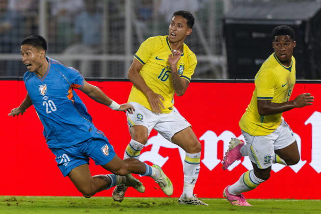 KOLKATA, INDIA - OCTOBER 3: Hmingthanmawia Ralte of India, Mauro Jaqueson Junior Ferreira dos Santos of Brazil duel for the ball during friendly match between India and Brazil at the Vivekananda Yuba Bharati Krirangan (VYBK) Stadium in Kolkata, India on 3rd October, 2026 Copyright: xUnnatixNaidux Sportspressphoto_SPR245196
