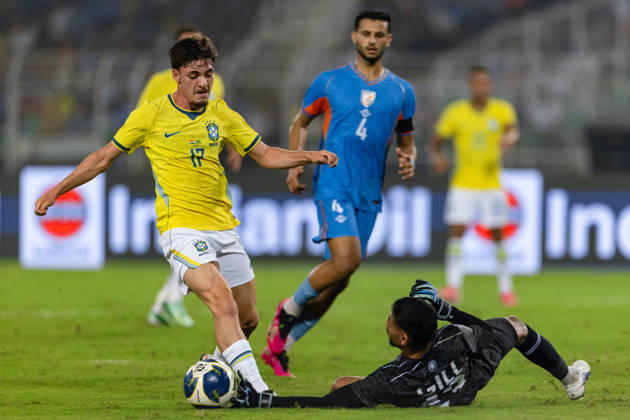 KOLKATA, INDIA - OCTOBER 3: Breno de Souza Bidon of Brazil and Prabhsukhan Singh Gill of India duel for the ball during friendly match between India and Brazil at the Vivekananda Yuba Bharati Krirangan (VYBK) Stadium in Kolkata, India on 3rd October, 2026 Copyright: xUnnatixNaidux Sportspressphoto_SPR245204