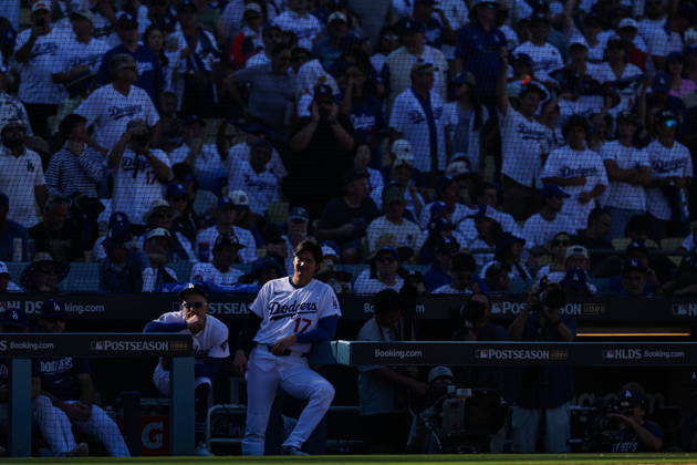 MLB, Baseball Herren, USA National League Division Series - Dodgers vs Braves Game 1 Los Angeles Dodgers designated hitter Shohei Ohtani looks on from the dugout during the eighth inning in Game 1 of the National League Division Series between the Atlanta Braves and the Los Angeles Dodgers at UNIQLO Field at Dodger Stadium in Los Angeles, California, USA, 03 October 2026. LOS ANGELES CALIFORNIA UNITED STATES  Copyright: xCHRISxTORRESx