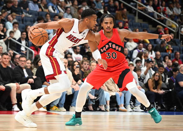 October 3, 2026, Quebec, On, Canada: Miami Heat s Giannis Antetokounmpo drives as Toronto Raptors Collin Murray-Boyles defends during NBA, Basketball Herren, USA preseason basketball action in Quebec City, Saturday, Oct. 3, 2026. Canada News - October 3, 2026  - ZUMAc35_ 20261003_zaf_c35_121 Copyright: xJacquesxBoissinotx