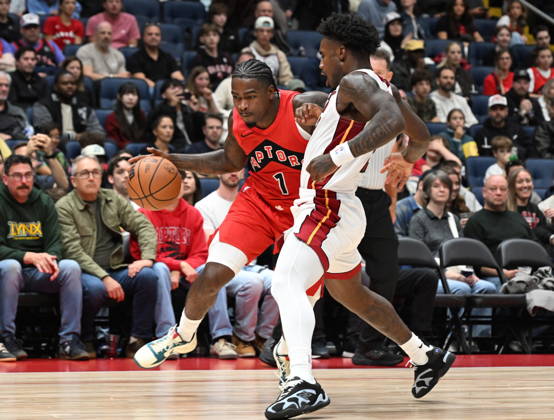 October 3, 2026, Quebec, On, Canada: Toronto Raptors Jamal Shead, left, drives past Miami Heat s Davion Mitchell during NBA, Basketball Herren, USA preseason basketball action in Quebec City, Saturday, Oct. 3, 2026. Canada News - October 3, 2026  - ZUMAc35_ 20261003_zaf_c35_124 Copyright: xJacquesxBoissinotx