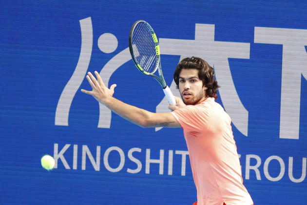 October 4, 2026, Tokyo, Japan: Carlos Alcaraz (Spain) returns a shot against Denis Shapovalov (Canada) during their quarterfinal match at the Kinoshita Group Japan Open Tennis Championships at Ariake Colosseum in Tokyo. Shapovalov suffered an injury, forcing him to retire early in the second set. The tournament runs from September 29 to October 6. Alcaraz won 7-6(3), 2-1 Tokyo Japan - ZUMAm191 20261004_aap_m191_073 Copyright: xRodrigoxReyesxMarinx