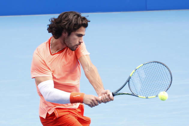 October 4, 2026, Tokyo, Japan: Carlos Alcaraz (Spain) returns a shot against Denis Shapovalov (Canada) during their quarterfinal match at the Kinoshita Group Japan Open Tennis Championships at Ariake Colosseum in Tokyo. Shapovalov suffered an injury, forcing him to retire early in the second set. The tournament runs from September 29 to October 6. Alcaraz won 7-6(3), 2-1 Tokyo Japan - ZUMAm191 20261004_aap_m191_055 Copyright: xRodrigoxReyesxMarinx