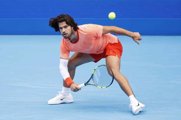 October 4, 2026, Tokyo, Japan: Carlos Alcaraz (Spain) returns a shot against Denis Shapovalov (Canada) during their quarterfinal match at the Kinoshita Group Japan Open Tennis Championships at Ariake Colosseum in Tokyo. Shapovalov suffered an injury, forcing him to retire early in the second set. The tournament runs from September 29 to October 6. Alcaraz won 7-6(3), 2-1 Tokyo Japan - ZUMAm191 20261004_aap_m191_048 Copyright: xRodrigoxReyesxMarinx