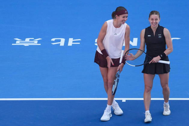 (261007) -- BEIJING, Oct. 7, 2026 -- Nikola Bartunkova(L) Maja Chwalinska react during the women s doubles round of 16 match between Katerina Siniakova(the Cezch Republic) Zhang Shuai(China) and Nikola Bartunkova(the Cezch Republic) Maja Chwalinska(Poland) at 2026 China Open tennis tournament in Beijing, China, Oct. 7, 2026. ) (SP)CHINA-BEIJING-TENNIS-CHINA OPEN-WOMEN S DOUBLES (CN) JuxHuanzong 