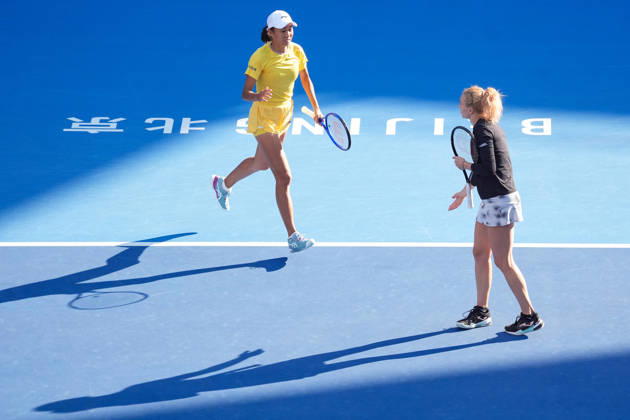(261007) -- BEIJING, Oct. 7, 2026 -- Katerina Siniakova Zhang Shuai (L) compete during the women s doubles round of 16 match between Katerina Siniakova(the Cezch Republic) Zhang Shuai(China) and Nikola Bartunkova(the Cezch Republic) Maja Chwalinska(Poland) at 2026 China Open tennis tournament in Beijing, China, Oct. 7, 2026. ) (SP)CHINA-BEIJING-TENNIS-CHINA OPEN-WOMEN S DOUBLES (CN) JuxHuanzong 