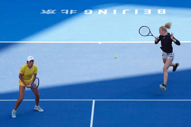 (261007) -- BEIJING, Oct. 7, 2026 -- Katerina Siniakova (R) Zhang Shuai compete during the women s doubles round of 16 match between Katerina Siniakova(the Cezch Republic) Zhang Shuai(China) and Nikola Bartunkova(the Cezch Republic) Maja Chwalinska(Poland) at 2026 China Open tennis tournament in Beijing, China, Oct. 7, 2026. ) (SP)CHINA-BEIJING-TENNIS-CHINA OPEN-WOMEN S DOUBLES (CN) JuxHuanzong 