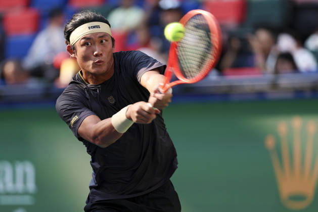(261007) -- SHANGHAI, Oct. 7, 2026 -- Zhang Zhizhen hits a return during the men s singles first round match between Zhang Zhizhen of China and Tomas Machac of the Czech Republic at the 2026 ATP, Tennis Herren tour Shanghai Masters tennis tournament in Shanghai, China, Oct. 7, 2026. ) (SP)CHINA-SHANGHAI-TENNIS-SHANGHAI MASTERS-MEN S SINGLES (CN) WangxXiang 
