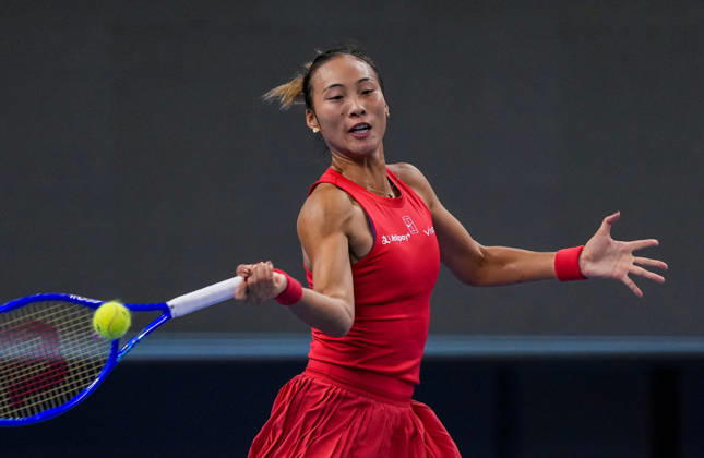 (261007) -- BEIJING, Oct. 7, 2026 -- Zheng Qinwen competes during the women s singles fourth round match between Zheng Qinwen of China and Alina Charaeva of Armenia at 2026 China Open tennis tournament in Beijing, China, Oct. 7, 2026. ) (SP)CHINA-BEIJING-TENNIS-CHINA OPEN-WOMEN S SINGLES (CN) SunxFei 