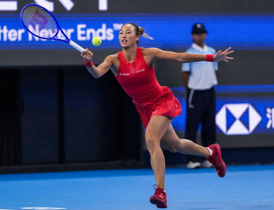 (261007) -- BEIJING, Oct. 7, 2026 -- Zheng Qinwen competes during the women s singles fourth round match between Zheng Qinwen of China and Alina Charaeva of Armenia at 2026 China Open tennis tournament in Beijing, China, Oct. 7, 2026. ) (SP)CHINA-BEIJING-TENNIS-CHINA OPEN-WOMEN S SINGLES (CN) SunxFei 