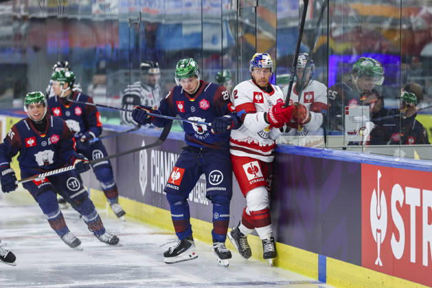 Ice hockey, Eishockey - CHL, EC RBS vs Berlin SALZBURG,AUSTRIA,07.OCT.26 - ICE HOCKEY - CHL, Champions Hockey League, group stage, EC Red Bull Salzburg vs Eisbaeren Berlin. Image shows Rihards Griva (Berlin) and Michael Raffl (EC RBS).  GEPAxpictures xDavidxGeieregger