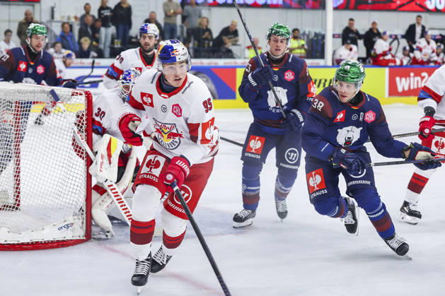 Ice hockey, Eishockey - CHL, EC RBS vs Berlin SALZBURG,AUSTRIA,07.OCT.26 - ICE HOCKEY - CHL, Champions Hockey League, group stage, EC Red Bull Salzburg vs Eisbaeren Berlin. Image shows Lukas Daniel Hoerl (EC RBS) and Yannick Veilleux (Berlin).  GEPAxpictures xDavidxGeieregger