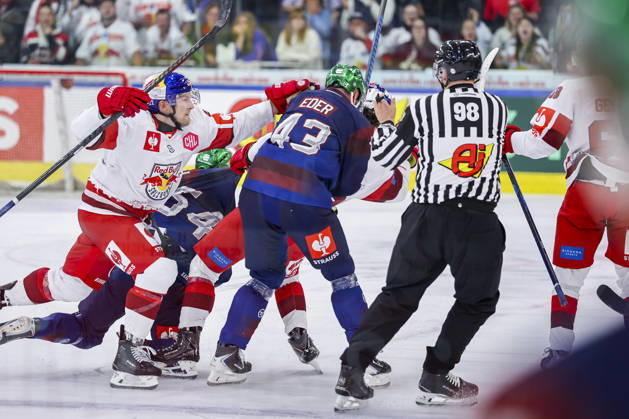 Ice hockey, Eishockey - CHL, EC RBS vs Berlin SALZBURG,AUSTRIA,07.OCT.26 - ICE HOCKEY - CHL, Champions Hockey League, group stage, EC Red Bull Salzburg vs Eisbaeren Berlin. Image shows Dennis Eamon Robertson (EC RBS) and Andreas Eder (Berlin).  GEPAxpictures xDavidxGeieregger