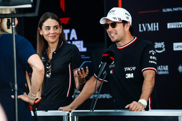F1 - SINGAPORE GRAND PRIX 2026 PEREZ Sergio (mex), Cadillac F1 Team MAC-26, portrait with India de la Fressange, communications manager at Cadillac F1 Team during an interview lduring the 2026 Formula 1 Singapore Grand Prix, 17th round of the 2026 Formula One World Championship, WM, Weltmeisterschaft from October 9 to 11, 2026 on the Marina Bay Street Circuit, in Singapore, Singapore - SingaporeSingapore  Copyright: xFLORENTxGOODENx