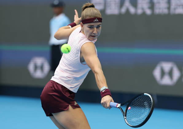 (261008) -- BEIJING, Oct. 8, 2026 -- Karolina Muchova of the Czech Republic hits a return during the women s singles quarterfinal match between Karolina Muchova of the Czech Republic and Nikola Bartunkova of the Czech Republic at 2026 China Open tennis tournament in Beijing, China, Oct. 8, 2026. ) (SP)CHINA-BEIJING-TENNIS-CHINA OPEN-WOMEN S SINGLES (CN) ZhangxChenlin