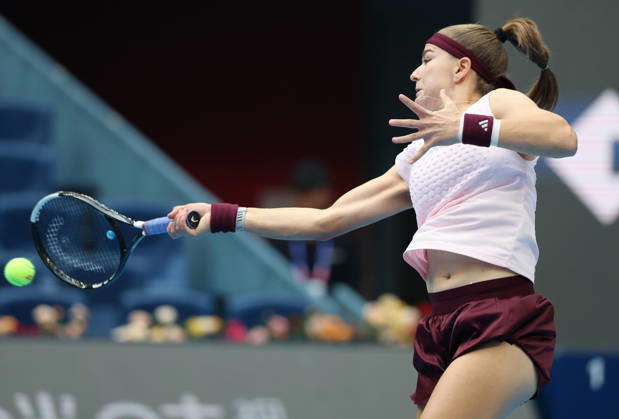 (261008) -- BEIJING, Oct. 8, 2026 -- Karolina Muchova of the Czech Republic hits a return during the women s singles quarterfinal match between Karolina Muchova of the Czech Republic and Nikola Bartunkova of the Czech Republic at 2026 China Open tennis tournament in Beijing, China, Oct. 8, 2026. ) (SP)CHINA-BEIJING-TENNIS-CHINA OPEN-WOMEN S SINGLES (CN) ZhangxChenlin
