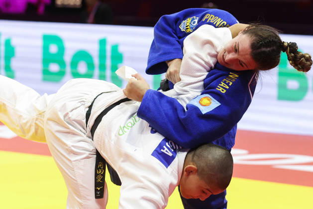 AZERBAIJAN, BAKU - OCTOBER 8, 2026: Michaela Polleres (top) of Austria and Ai Tsunoda Roustant of Spain compete in their -70 kg bout as part of the 2026 World Judo Championships at the National Gymnastics Arena. Mikhail Sinitsyn TASS  98957468