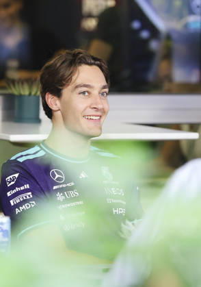 October 8, 2026, Singapore, Kaohsiung City, Singapore: GEORGE RUSSELL of Mercedes-AMG Petronas Formula One Team smiles and enjoys a cheerful conversation in the team s hospitality area in the paddock ahead of the 2026 Formula 1 Singapore Grand Prix at Marina Bay Street Circuit in Singapore. Singapore Singapore - ZUMAh201 20261008_zsp_h201_021 Copyright: xYichinxHoux