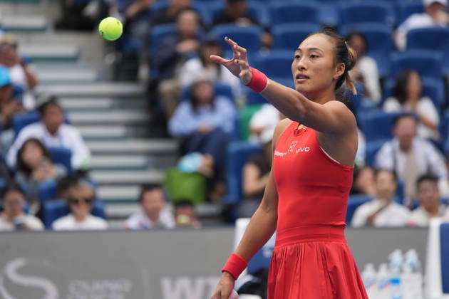 (261009) -- BEIJING, Oct. 9, 2026 -- Zheng Qinwen of China catches the ball during the women s singles quarterfinal match between Zheng Qinwen of China and Elina Svitolina of Ukraine at 2026 China Open tennis tournament in Beijing, China, Oct. 9, 2026. ) (SP)CHINA-BEIJING-TENNIS-CHINA OPEN-WOMEN S SINGLES (CN) XiexHan 