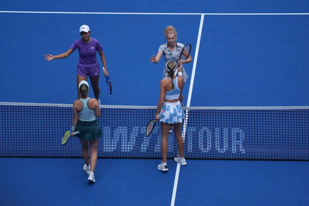 (261009) -- BEIJING, Oct. 9, 2026 -- Katerina Siniakova (top R) Zhang Shuai (top L) greet Storm Hunter (bottom L) Kristina Mladenovic after the women s doubles quarterfinal match between Katerina Siniakova (the Cezch Republic) Zhang Shuai (China) and Storm Hunter (Australia) Kristina Mladenovic (France) at 2026 China Open tennis tournament in Beijing, China, Oct. 9, 2026. ) (SP)CHINA-BEIJING-TENNIS-CHINA OPEN-WOMEN S DOUBLES (CN) XiexHan 