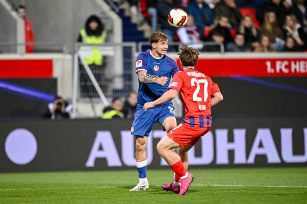 Paul Joly (1. FC Kaiserslautern) und Michael Heule (1. FC Heidenheim 1846) im Zweikampf waehrend des spiels der 2. Bundesliga zwischen 1. FC Heidenheim und 1. FC Kaiserslautern, Voith-Arena am 09. October 2026 in Heidenheim an der Brenz, Deutschland. (Foto von Harry Langer DeFodi Images) +++ Paul Joly (1. FC Kaiserslautern) und Michael Heule (1. FC Heidenheim 1846) battle for the ball during the 2nd Bundesliga match between 1. FC Heidenheim and 1. FC Kaiserslautern at Voith-Arena on October 9, 2026 in Heidenheim an der Brenz, Germany. (Photo by Harry Langer DeFodi Images) DFB DFL REGULATIONS PROHIBIT ANY USE OF PHOTOGRAPHS AS IMAGE SEQUENCES AND OR QUASI-VIDEO. (Photo by Harry Langer DeFodi Images) DFB DFL REGULATIONS PROHIBIT ANY USE OF PHOTOGRAPHS AS IMAGE SEQUENCES AND OR QUASI-VIDEO. -