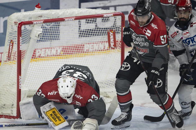PENNY DEL 1; Kölner Haie - Schwenninger Wild Wings; Köln, 09.10.2026 Nico Wiens (Kölner Haie, Torwart, 33); Brady Austin (Kölner Haie, Verteidigung, 57); PENNY DEL 1; Kölner Haie - Schwenninger Wild Wings am 09.10.2026 in der KA2 in Köln (Deutschland). Copyright: xBEAUTIFULxSPORTS AndreasxDickx