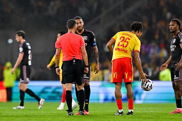 RC Lens v Olympique Lyonnais - Ligue 1 McDonald s 2026 2027 Jeremy STINAT, referee and Corentin TOLISSO of Lyon during Ligue 1 McDonald s match between Lens and Lyon at Stade Bollaert-Delelis on October 9, 2026 in Lens, France. Lens France  Copyright: xBaptistexFernandezx 776573289