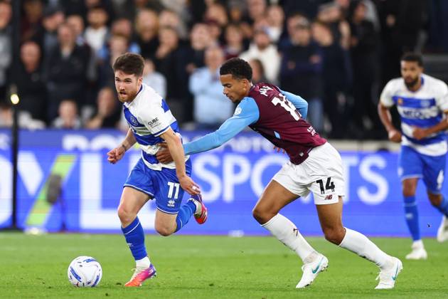 Paul Smyth of Queen Park Rangers under pressure from Divine Mukasa of West Ham United West Ham United v Queens Park Rangers, EFL Championship, Football, London Stadium, London, UK - 09 Oct 2026London London Stadium United Kingdom EDITORIAL USE ONLY No use with unauthorised audio, video, data, fixture lists, club league logos or live services. Online in-match use limited to 120 images, no video emulation. No use in betting, games or single club league player publications. Copyright: xSimonxDael Shutterstockx 17196556an