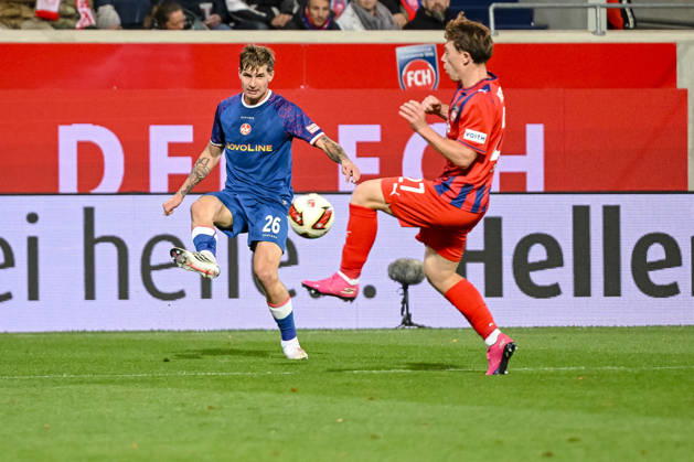 Paul Joly (1. FC Kaiserslautern) und Michael Heule (1. FC Heidenheim 1846) im Zweikampf waehrend des spiels der 2. Bundesliga zwischen 1. FC Heidenheim und 1. FC Kaiserslautern, Voith-Arena am 09. October 2026 in Heidenheim an der Brenz, Deutschland. (Foto von Harry Langer DeFodi Images) +++ Paul Joly (1. FC Kaiserslautern) und Michael Heule (1. FC Heidenheim 1846) battle for the ball during the 2nd Bundesliga match between 1. FC Heidenheim and 1. FC Kaiserslautern at Voith-Arena on October 9, 2026 in Heidenheim an der Brenz, Germany. (Photo by Harry Langer DeFodi Images) DFB DFL REGULATIONS PROHIBIT ANY USE OF PHOTOGRAPHS AS IMAGE SEQUENCES AND OR QUASI-VIDEO. (Photo by Harry Langer DeFodi Images) DFB DFL REGULATIONS PROHIBIT ANY USE OF PHOTOGRAPHS AS IMAGE SEQUENCES AND OR QUASI-VIDEO. -