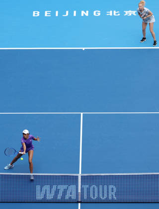 (261010) -- BEIJING, Oct. 10, 2026 -- Katerina Siniakova Zhang Shuai (L) compete during the women s doubles semifinal match between Katerina Siniakova (the Czech Republic) Zhang Shuai (China) and Erin Routliffe (New Zealand) Aldila Sutjiadi (Indonesia) at 2026 China Open tennis tournament in Beijing, China, Oct. 10, 2026. ) (SP)CHINA-BEIJING-TENNIS-CHINA OPEN-WOMEN S DOUBLES (CN) ZhangxChenlin