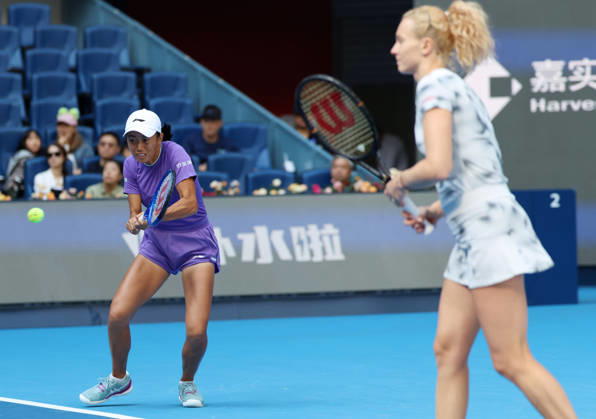 (261010) -- BEIJING, Oct. 10, 2026 -- Katerina Siniakova Zhang Shuai (L) compete during the women s doubles semifinal match between Katerina Siniakova (the Czech Republic) Zhang Shuai (China) and Erin Routliffe (New Zealand) Aldila Sutjiadi (Indonesia) at 2026 China Open tennis tournament in Beijing, China, Oct. 10, 2026. ) (SP)CHINA-BEIJING-TENNIS-CHINA OPEN-WOMEN S DOUBLES (CN) ZhangxChenlin