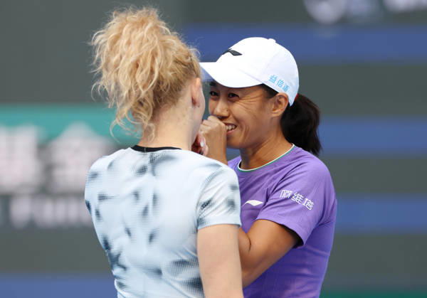 (261010) -- BEIJING, Oct. 10, 2026 -- Katerina Siniakova Zhang Shuai (R) discuss during the women s doubles semifinal match between Katerina Siniakova (the Czech Republic) Zhang Shuai (China) and Erin Routliffe (New Zealand) Aldila Sutjiadi (Indonesia) at 2026 China Open tennis tournament in Beijing, China, Oct. 10, 2026. ) (SP)CHINA-BEIJING-TENNIS-CHINA OPEN-WOMEN S DOUBLES (CN) ZhangxChenlin 