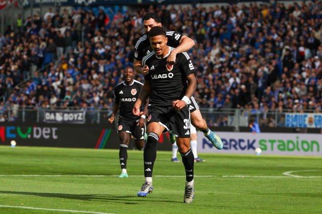 2026.10.10 Fussball 2.Bundesliga SV Darmstadt 98 - Energie Cottbus v.l., Tolcay Cigereci (Energie Cottbus) and Justin Butler (Energie Cottbus) seen celebrating after scoring goal to 0:1 Copyright: HMBxMedia JoaquimxFerreira